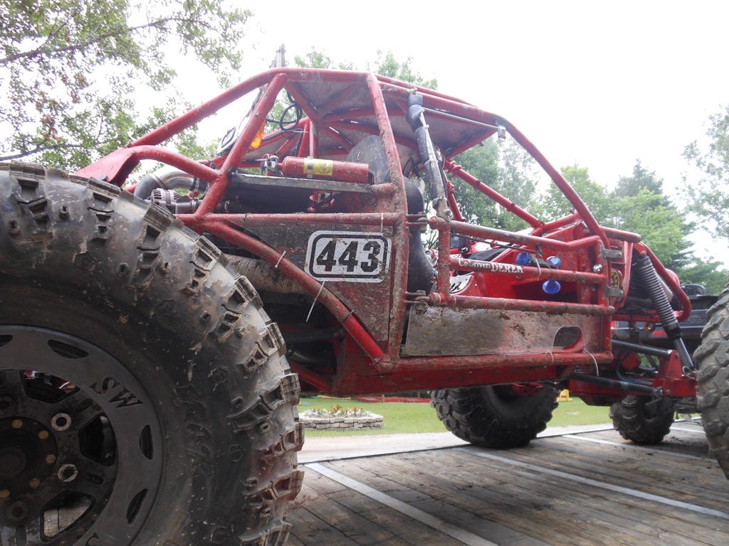 muddy offroad vehicle