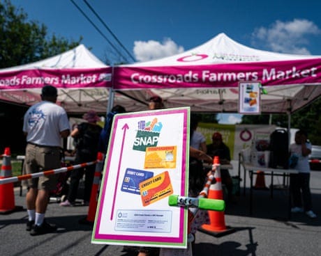 a sign in front of a tent a sign in front of a tent