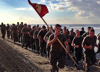 Marines running in formation.