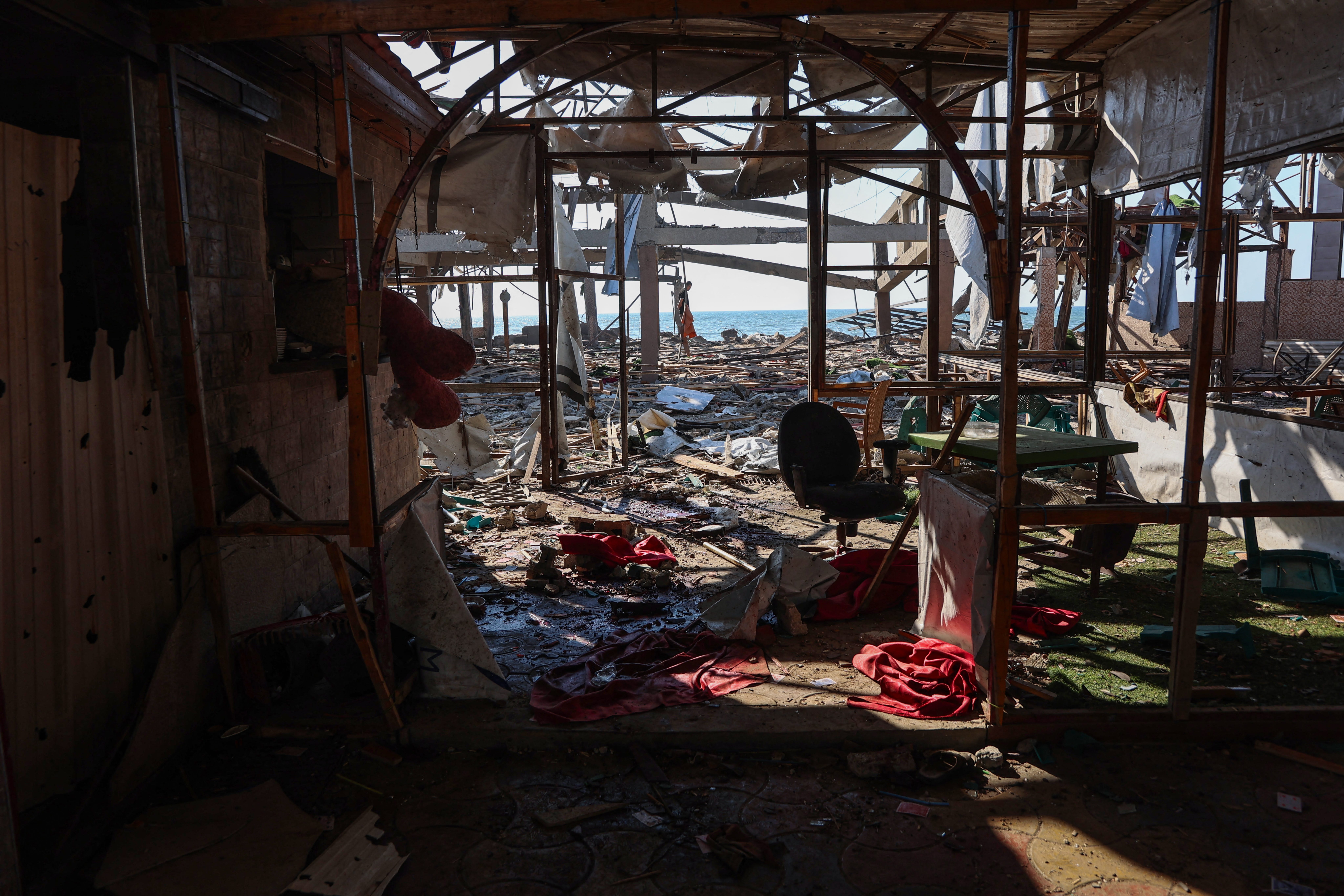 Israel Slaughters Dozens in Attack on Popular Gaza Cafe as Trump Claims a Ceasefire Deal is Moving Forward
