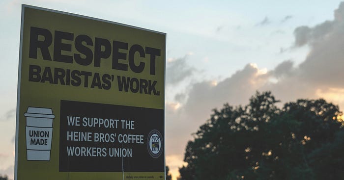 A union sign for the Heine Bros’ Coffee Workers Union. Retail workers deserve respect.
