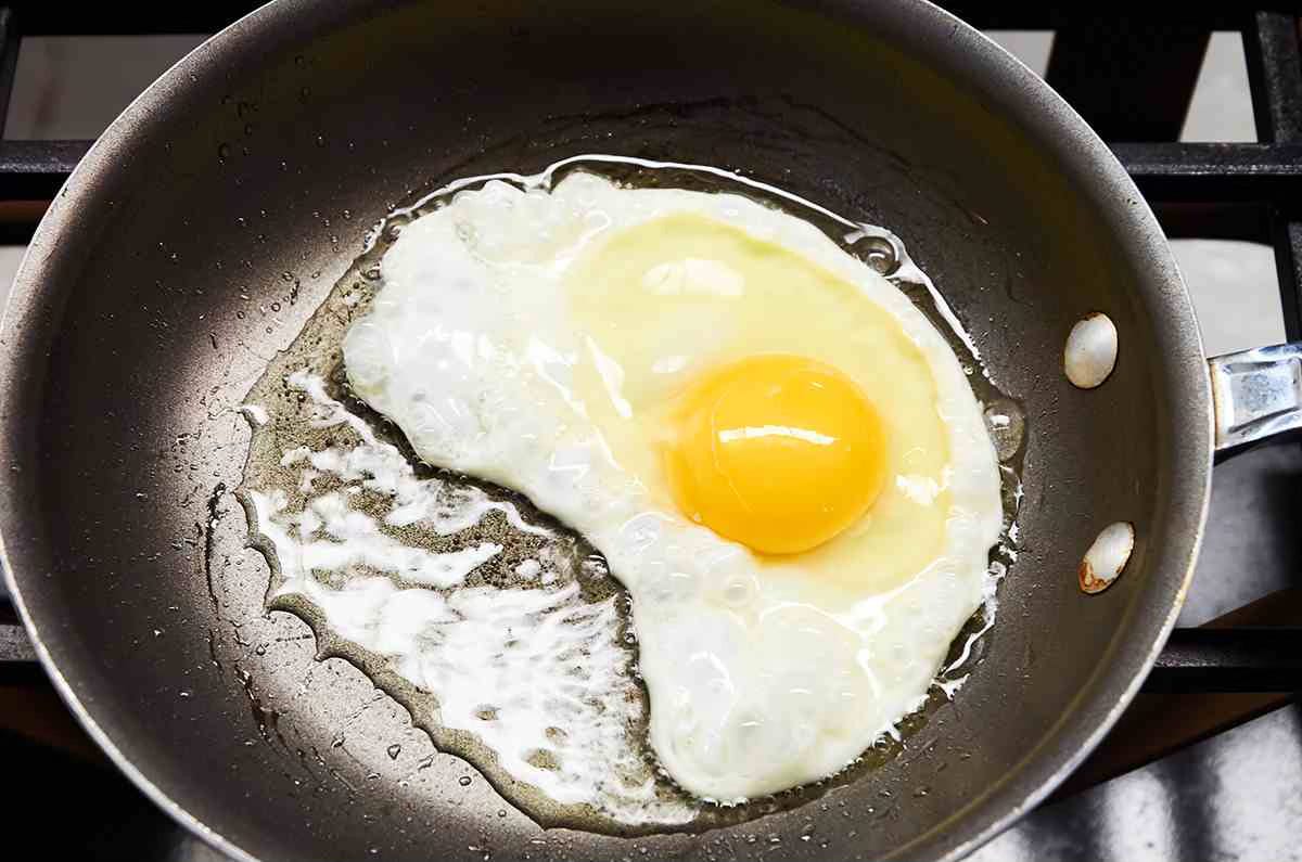 egg frying in pan