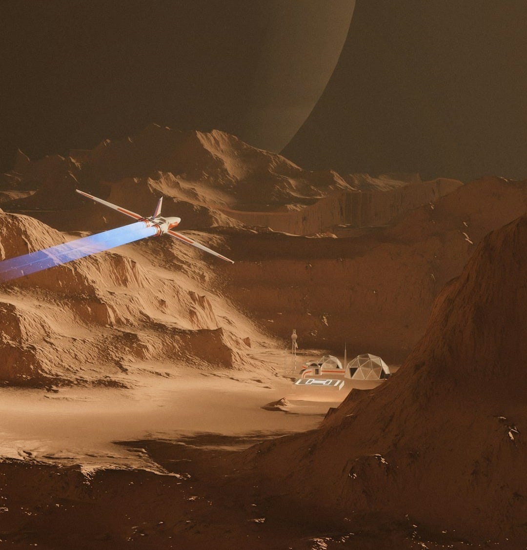 a helicopter flying over a mountain