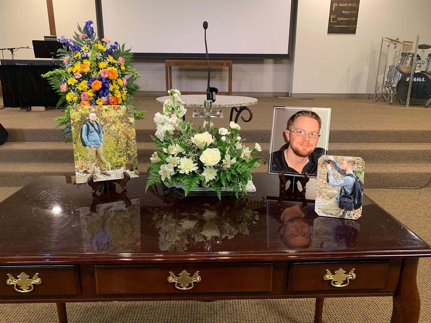 A bouquet of flowers surrounded by three pictures