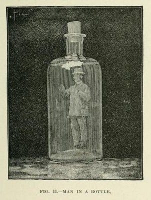 Nine old timey photos of everything from people exercising to cells to cats pretending to drink wine.
