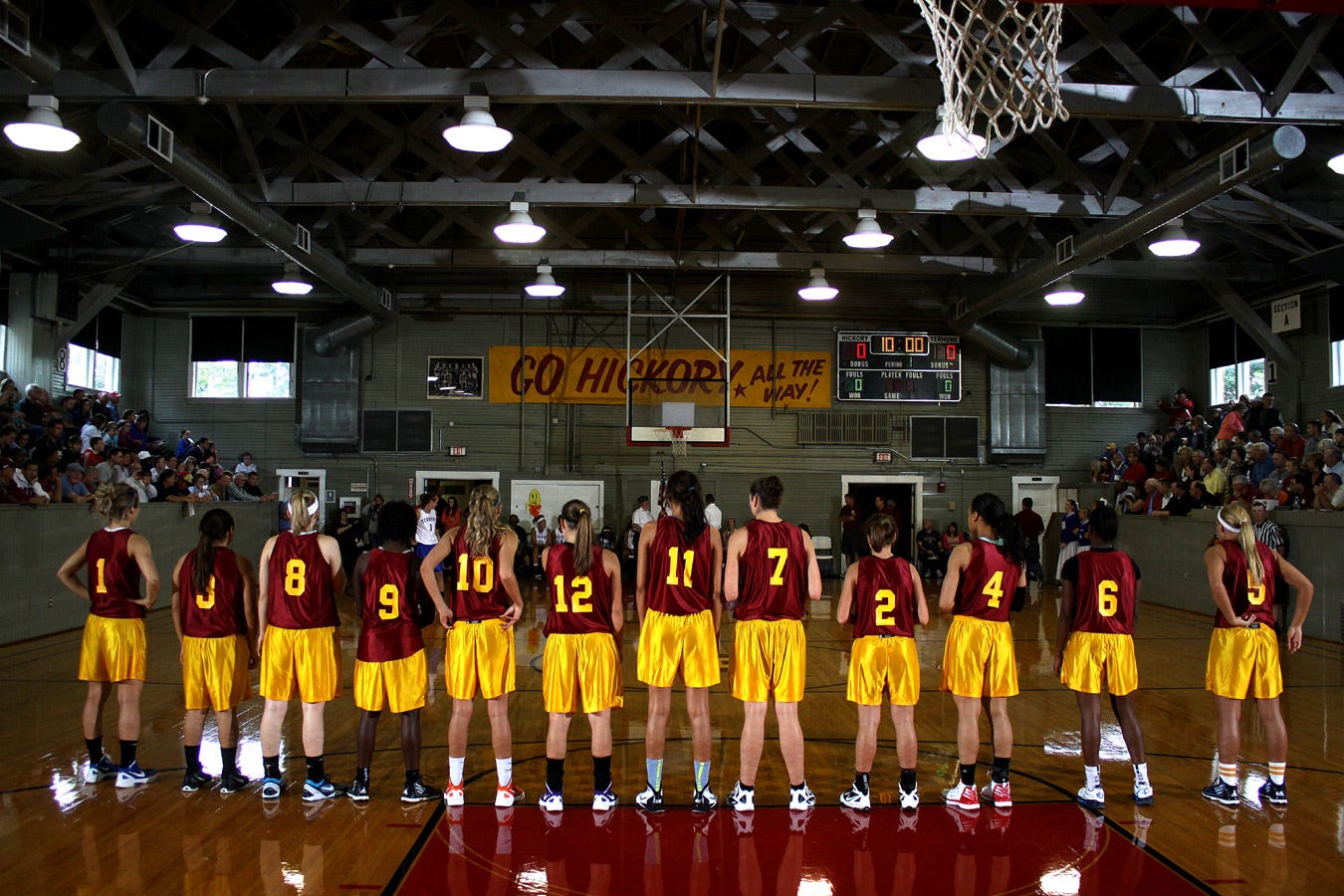 The Lady Hickory Huskers line up for introductions prior to the 2012 game. Some have described their visits to the Hoosier Gym as “stepping into a time machine.” Indeed, this photographer has witnessed grown men cry upon entering what, to them, must be a very special place.
