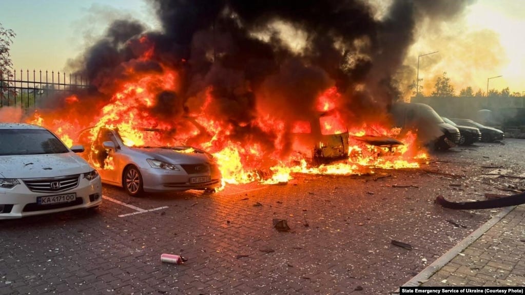 Cars burn after a Russian attack on the Kyiv region on September 20.  Cars burn after a Russian attack on the Kyiv region on September 20.