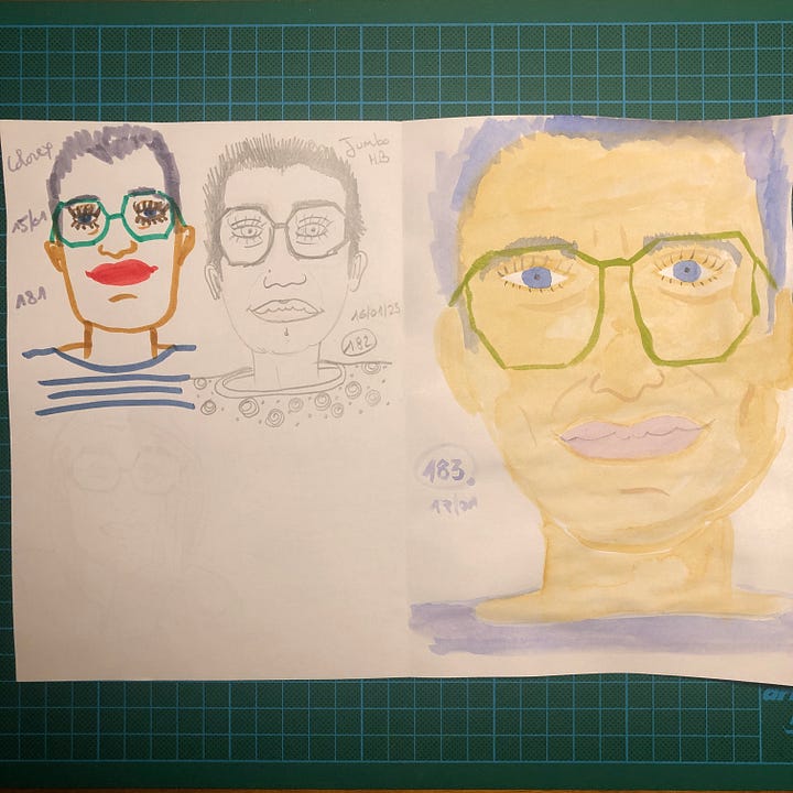 2 feuilles de papier blanc format A4 posé sur mon tapis de découpe. On y voit mes 7 derniers autoportraits dessinés avec : 1/ des feutres Staedtler 2/ des Blocks Inktense de Derwent 3/ Brsuh Sign Pen Pentel noir et crayons de couleurs Luminance 4/ brush pen Muji 5/ Colorex de Pébéo 6/ crayons graphite Jumbo HB de Faber-Castell 7/ aquarelles de Aquarelle de Provence