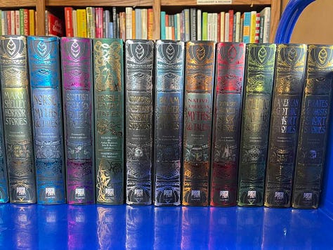 Bookshelves filled with colorful books, labeled "Classics"