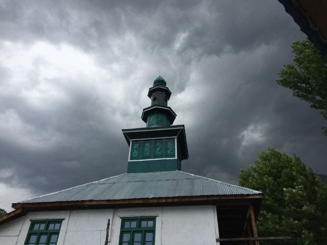 A mosque against cloudy skies. A mosque against cloudy skies.