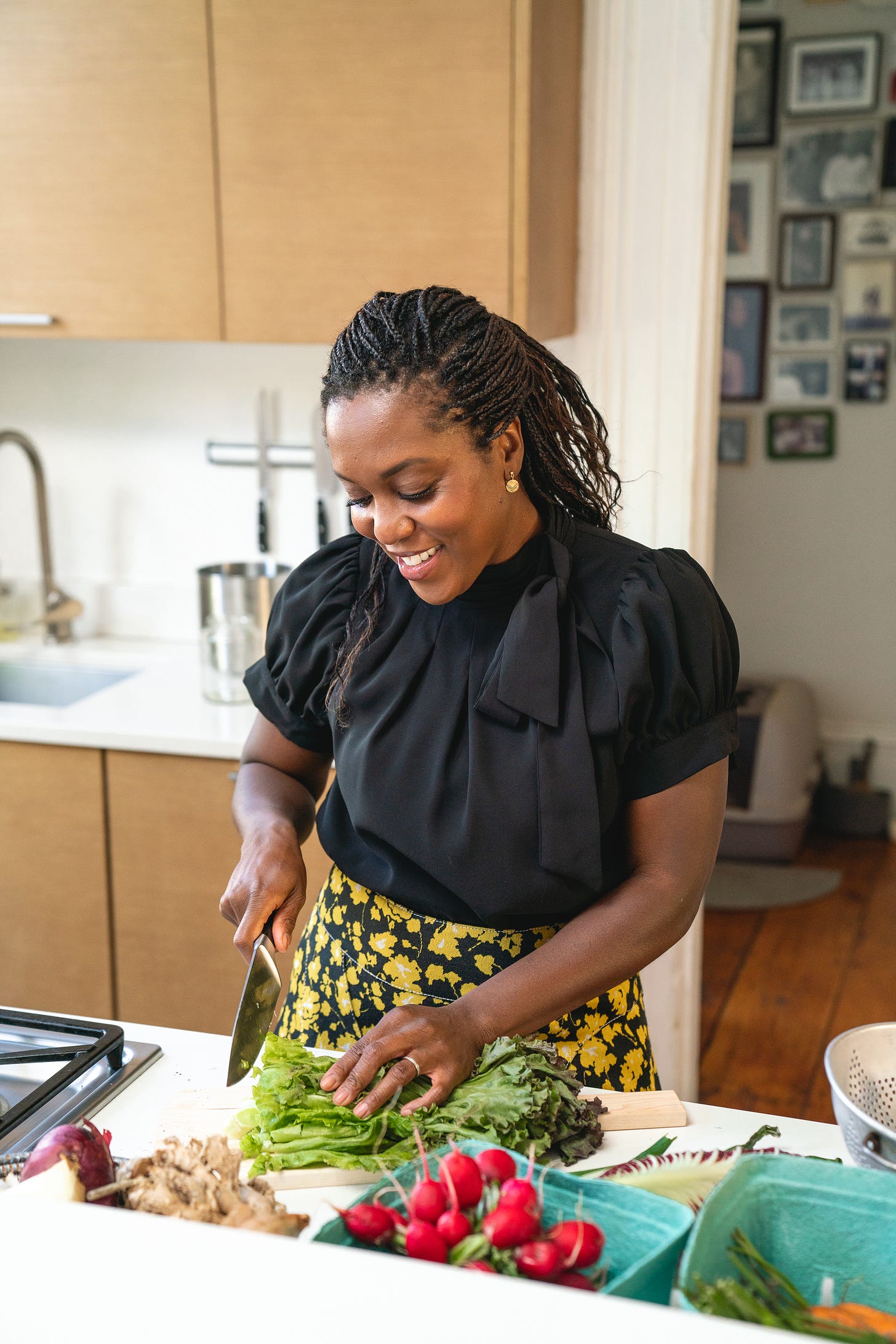 Maya Feller chopping lettuce Maya Feller chopping lettuce
