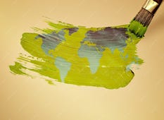 A paint brush painting a picture of the world.