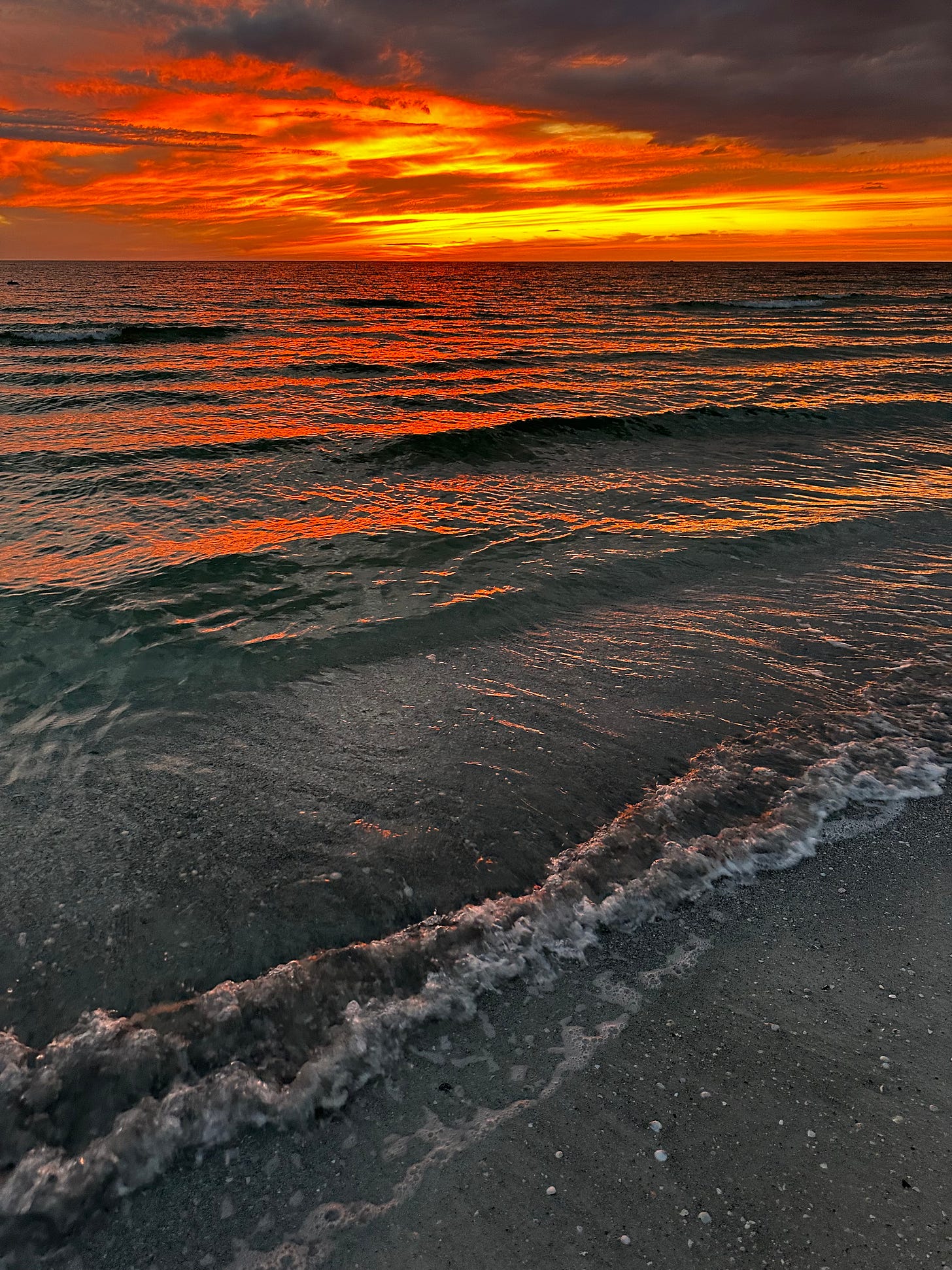 A sunset on St. Pete Beach, Florida, overlooking the Gulf of America.
