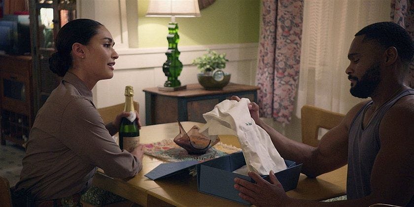 Walker Micki giving Trey a white shirt thing 1.16. Walker Micki giving Trey a white shirt thing 1.16.