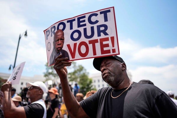 Thousands rally in Montgomery for a new voting rights era | AP News