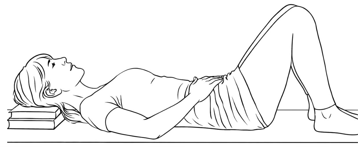 the lying down position, on the floor, books under the head and feet on the floor