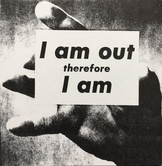 This may contain: a hand holding a sign that says i am out there before i am