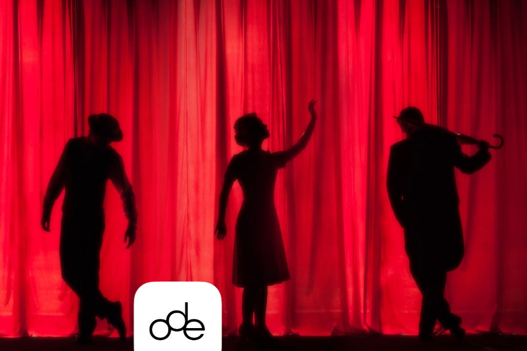 silhouette of three performers on stage silhouette of three performers on stage
