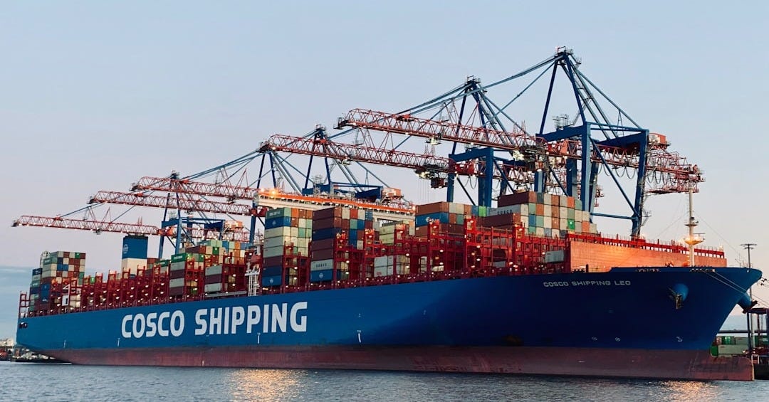 cargo ship on dock during daytime