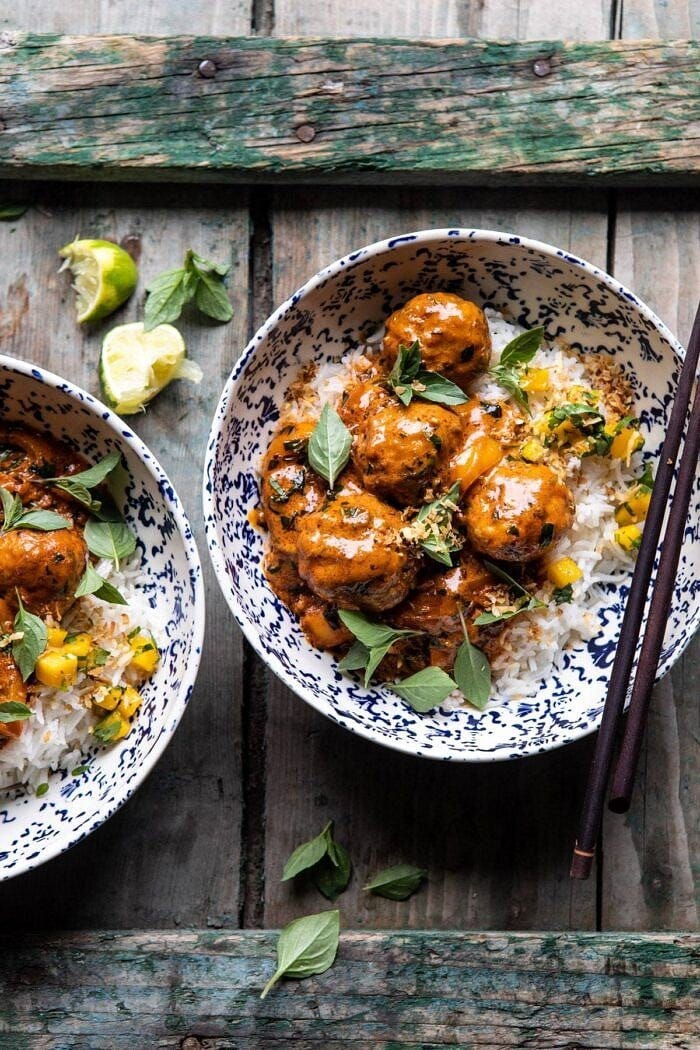overhead photo of Weeknight 30 Minute Coconut Curry Chicken Meatballs in bowl with rice