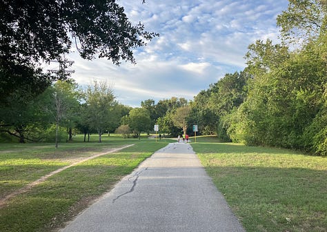 Different views of the trail - straight, curving, but almost all flat