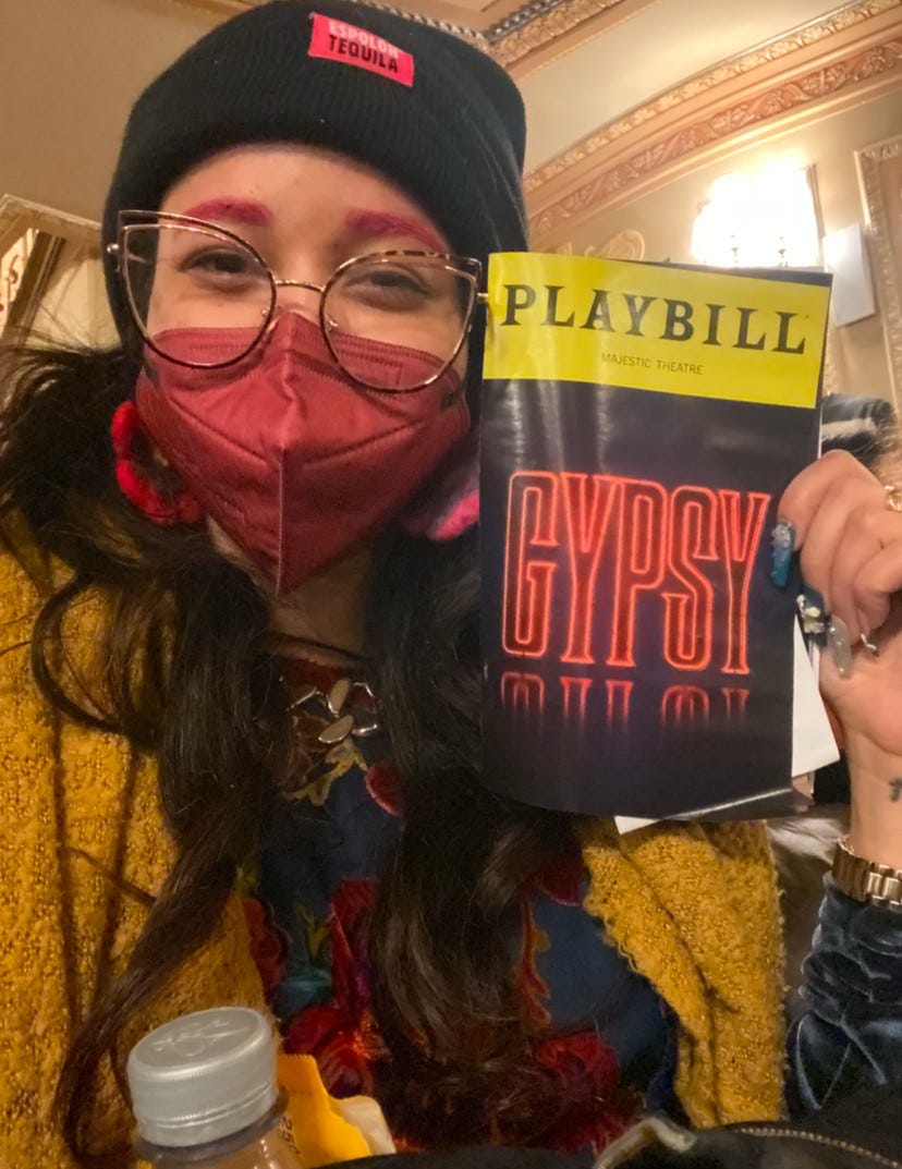 Kiana Holding up the GYPSY Playbill