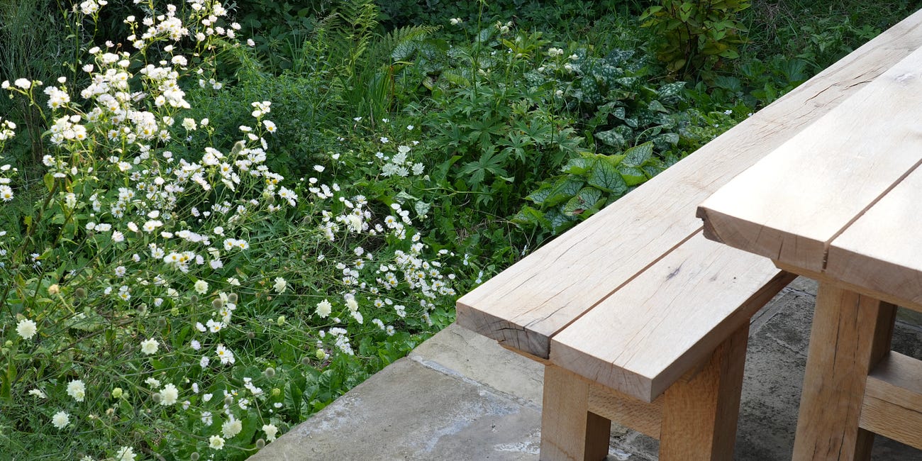 What materials should a patio or seating area be made from?