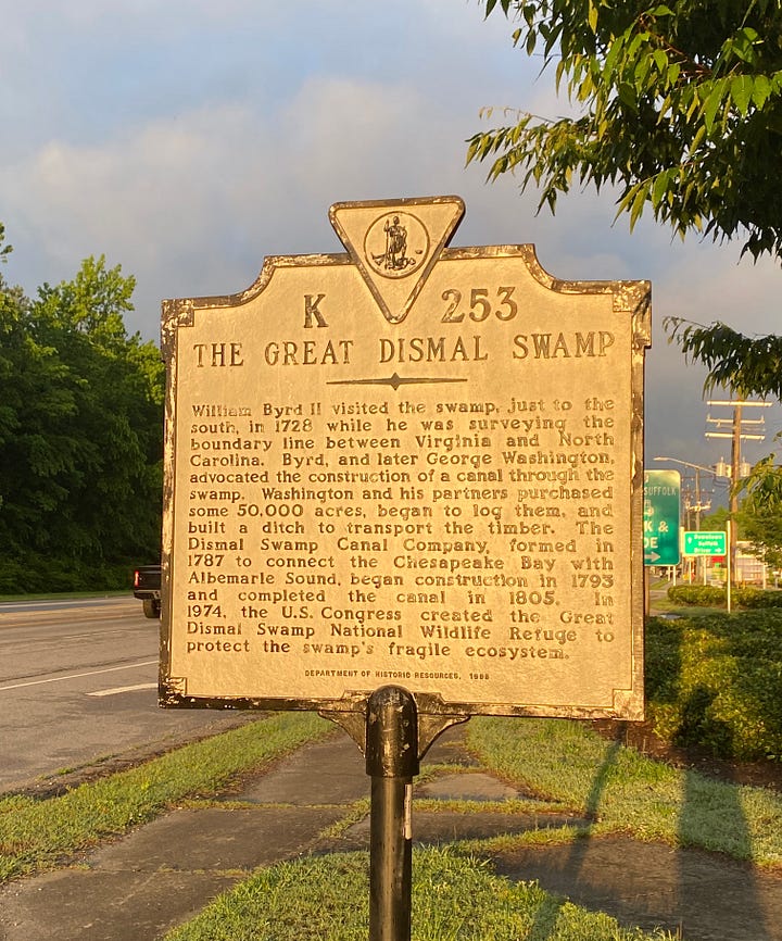 The Great Dismal Swamp historical marker and photo of the swamp canal by the U.S. Army Corps of Engineers, courtesy of Wikimedia Commons