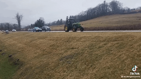 john deere tractor chase gif