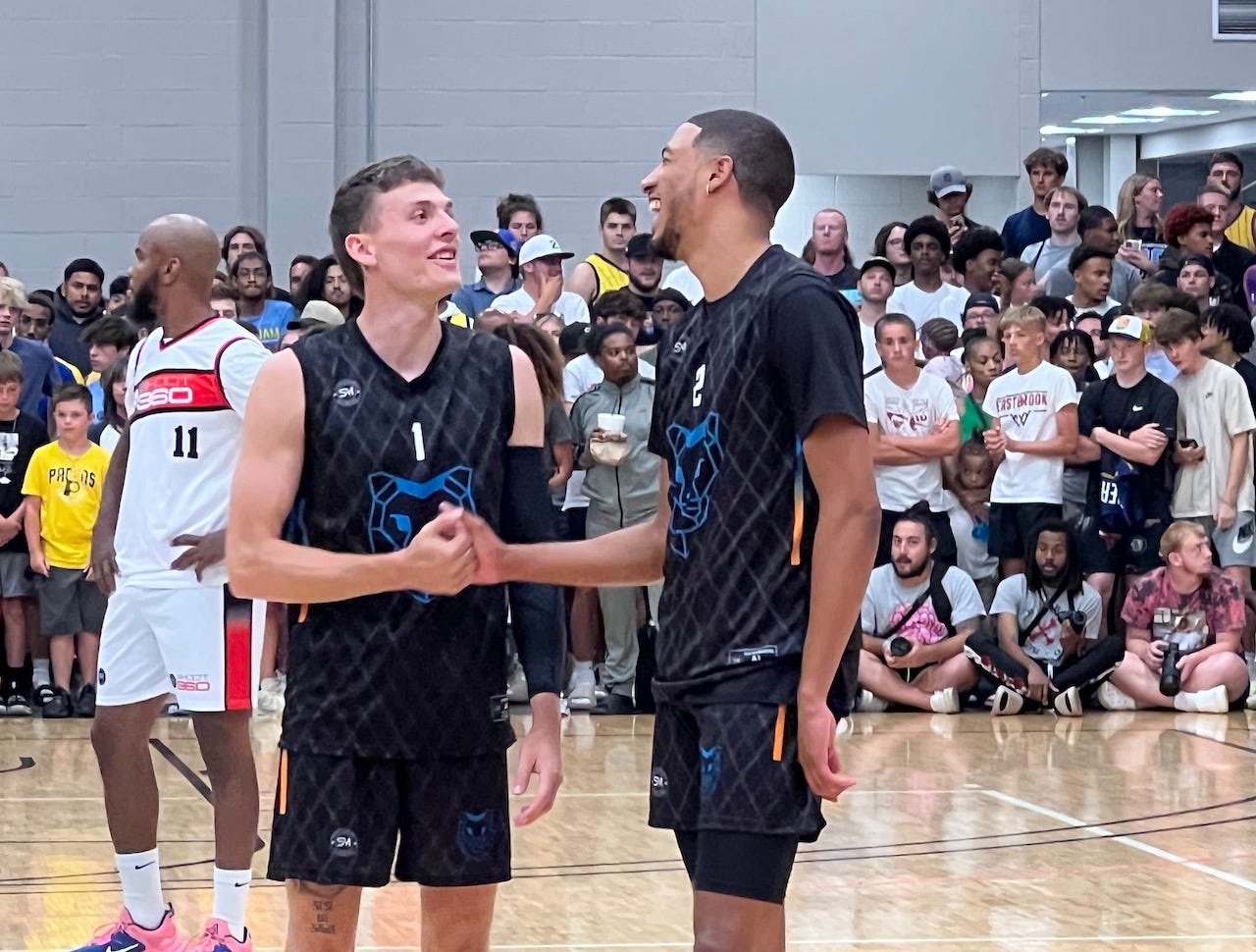 Kyle Guy and Tyrese Haliburton before the start of the game.