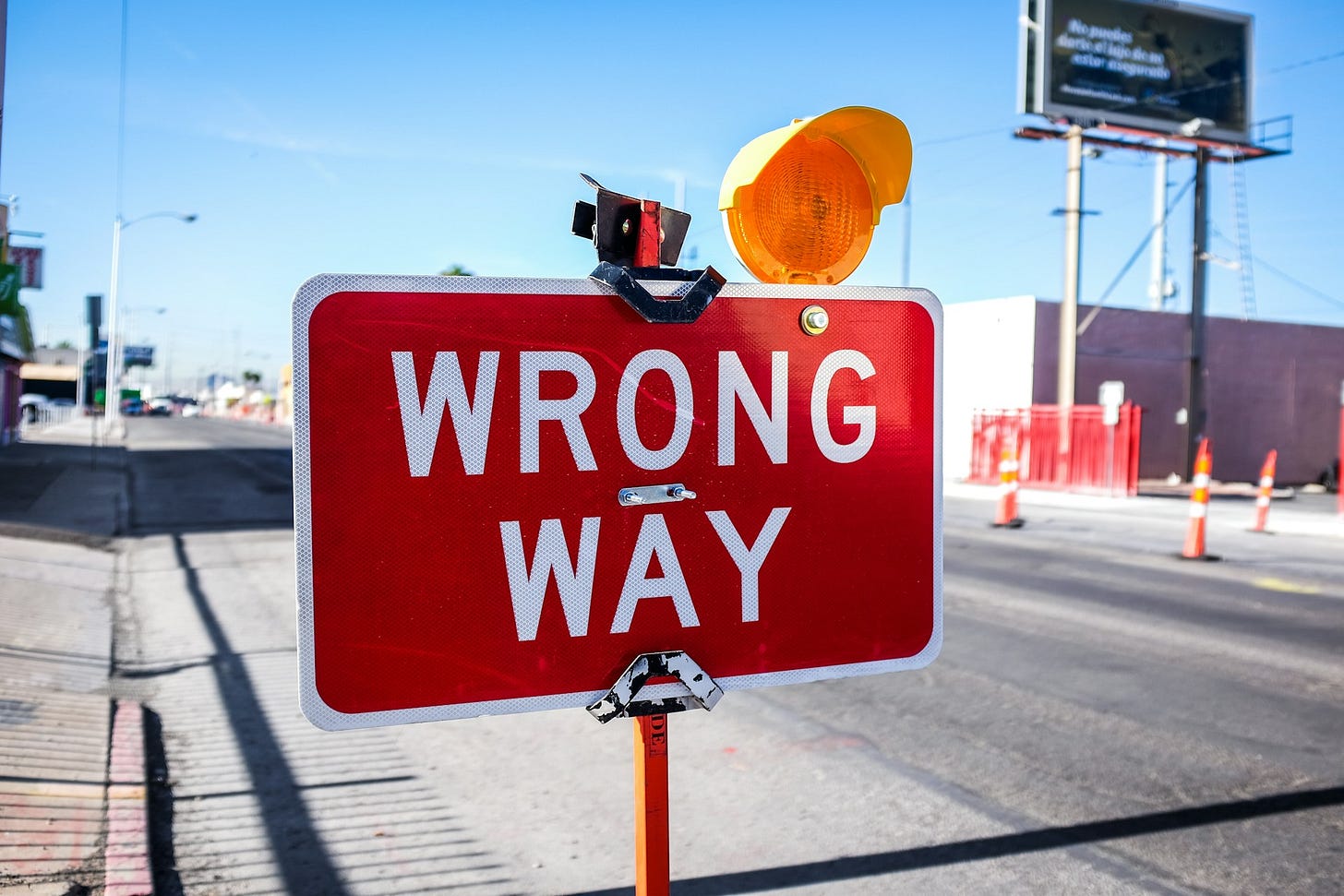 Road sign displaying WRONG WAY