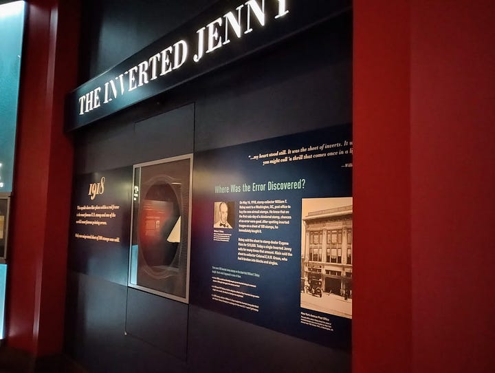 On left, block of four stamps showing upside down biplane. On the right, the entire museum display on this so-called Inverted Jenny stamp