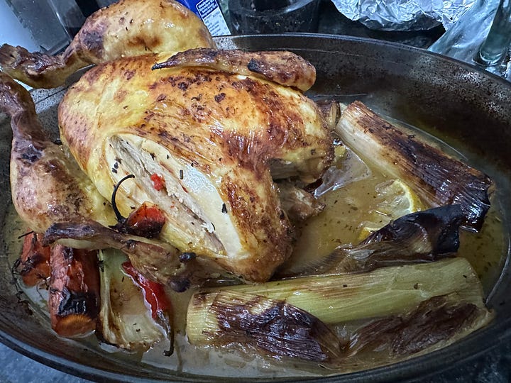 A roast bird and a plate with all the fixings. Extra spicy. 