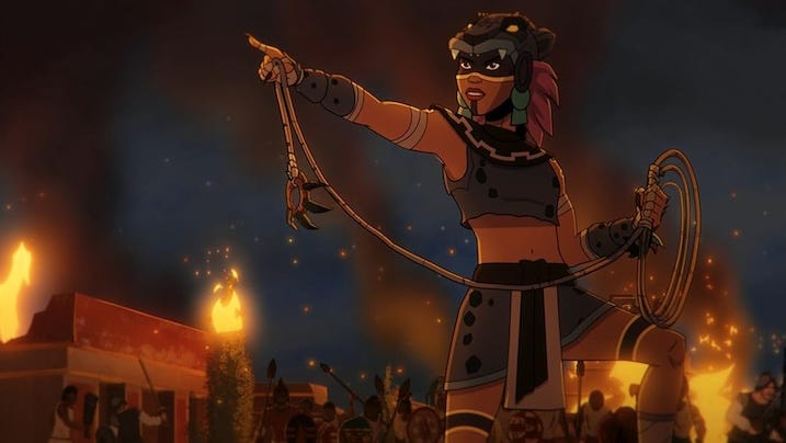 Jaguar Woman Alt text: Animated still of Jaguar Woman wielding a whip during a nighttime battle, surrounded by flames and chaos in Aztec Batman: Clash of Empires.