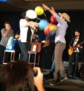 Jared brings Rob balloons while Misha whistles his appreciation