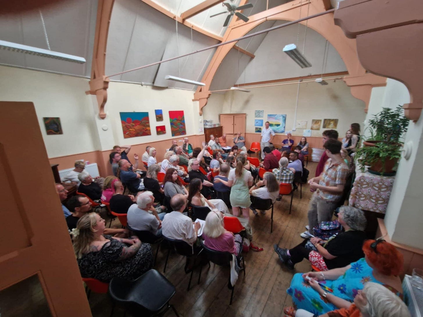 May be an image of 4 people, violin and crowd
