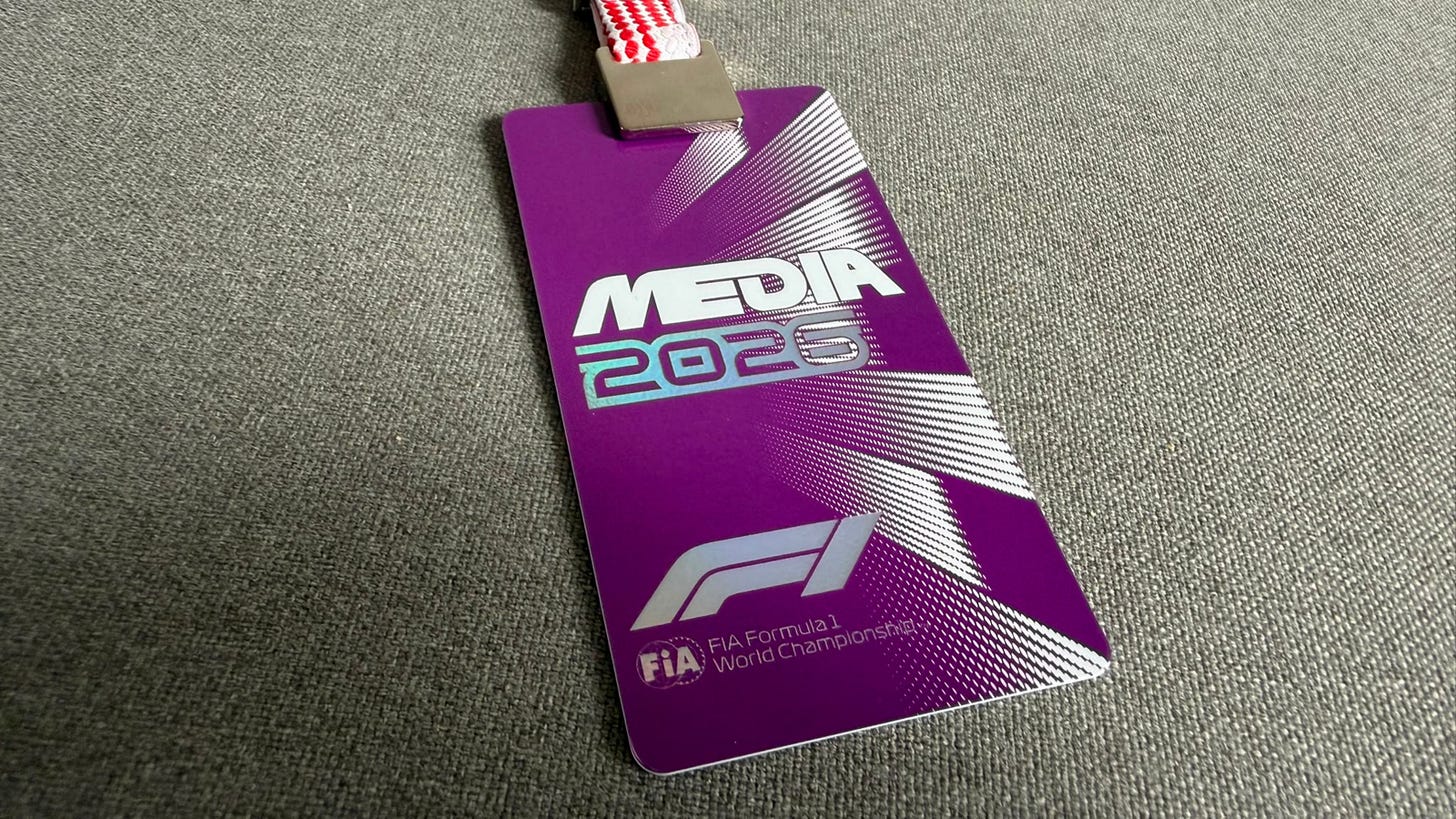 A purple Formula 1 media pass with the words 'Media 2026' written on the front of the card.