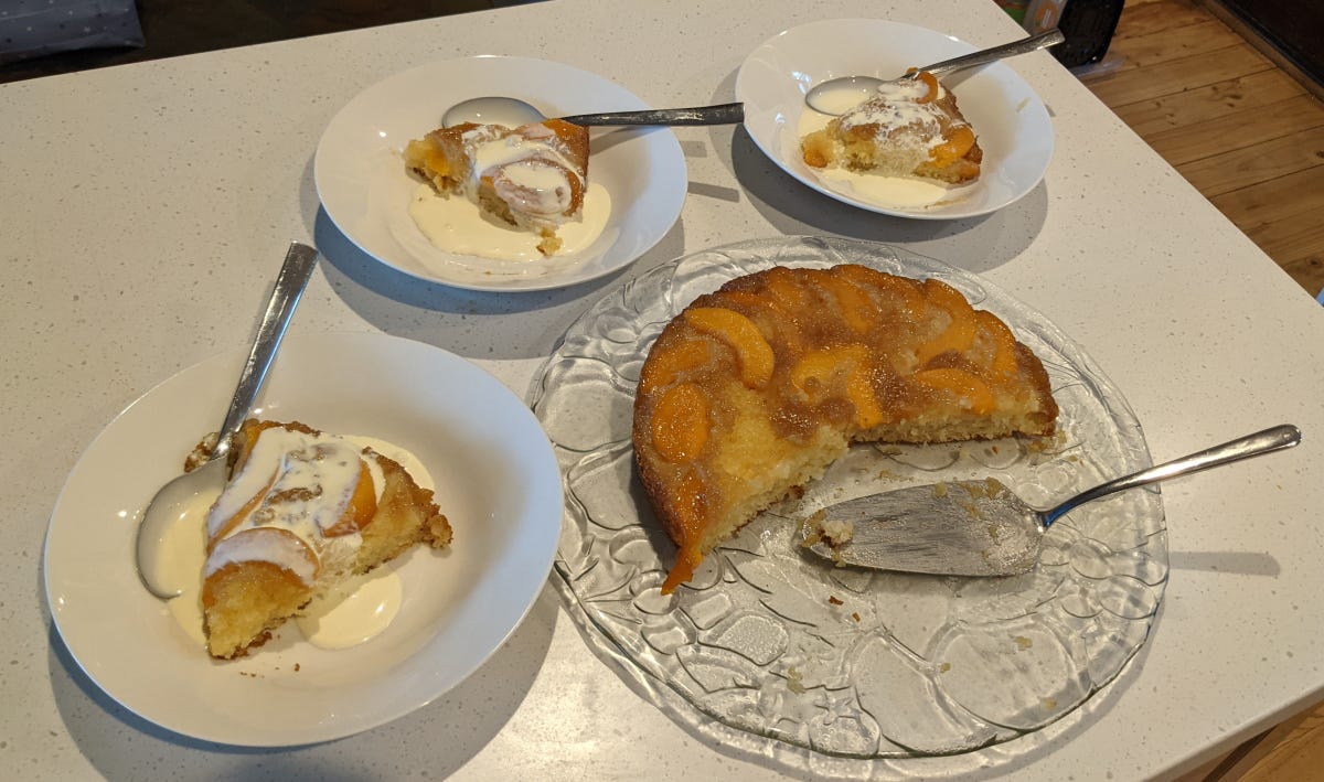 Three servings of cake and cream, looks tasty!