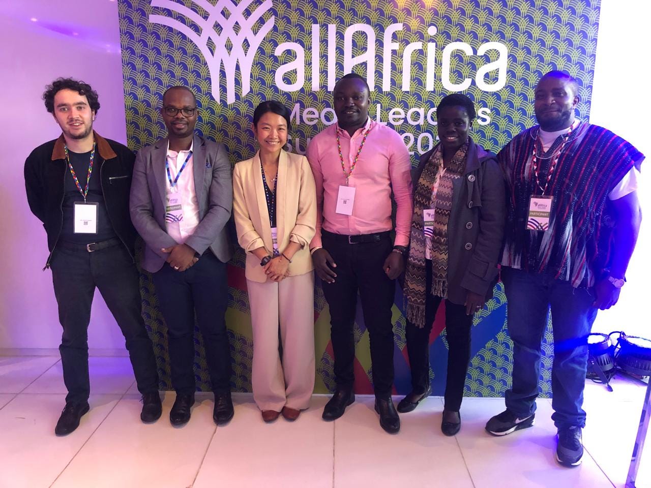 A group of people posing for a photo

AI-generated content may be incorrect.