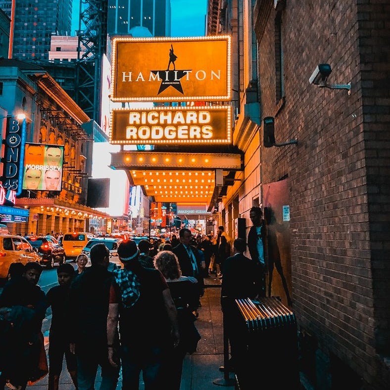 people walking on street during night time people walking on street during night time