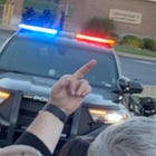 Angry protesters vs. happy Trumpsters