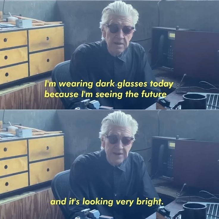 This may contain: an older man sitting at a desk in front of a computer monitor with the caption, i'm wearing dark glasses today because he is seeing the future and it's looking very bright