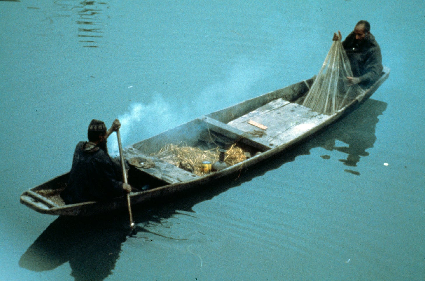 Two men rowing