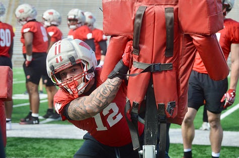 Wisconsin outside linebackers participate in individual position drills during the Badgers' spring football practice Saturday inside Camp Randall Stadium.