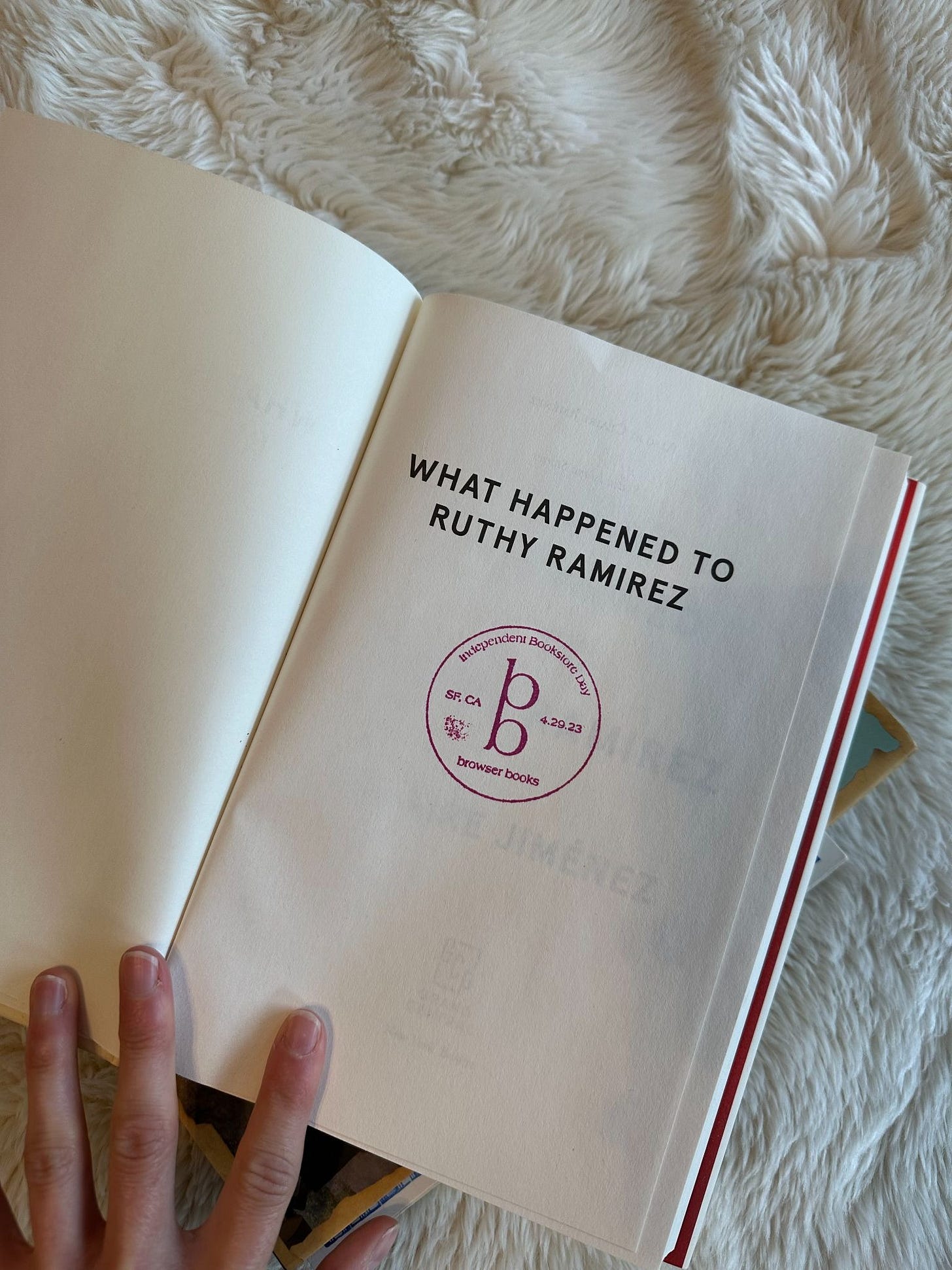 The inside of a book, showing a stamp that reads Independent Bookstore Day, Browser Books, 4.29.23
