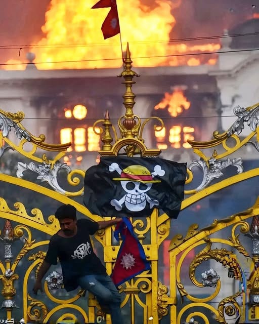 May be an image of 1 person, fire, crowd and text