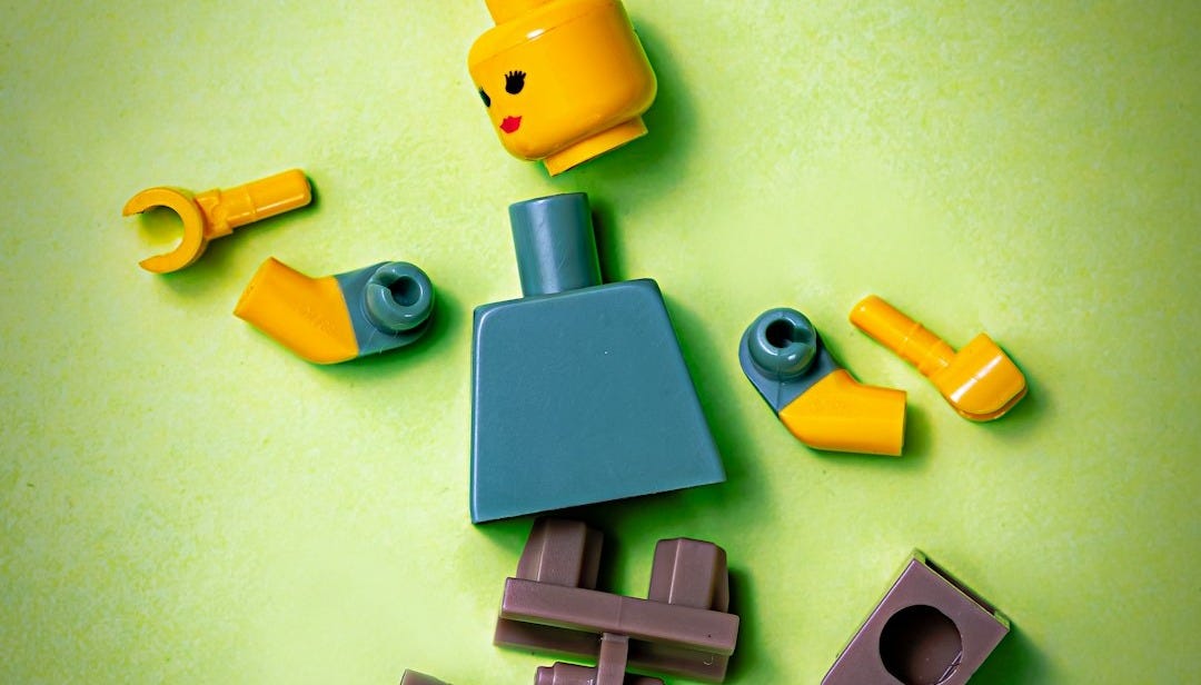 blue orange green and yellow plastic toy