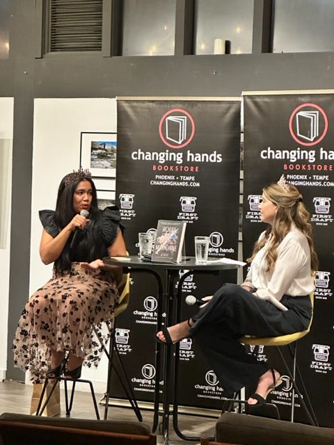 First photo: Alex signing with Adalyn at Changing Hands Tempe, Second photo: Alex chatting with J.Elle on stage at Changing Hands Phoenix