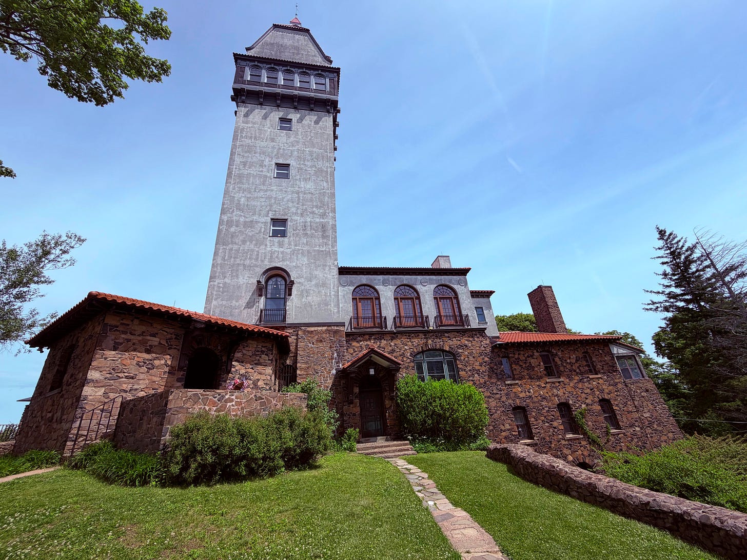 building, tower, sky, trees, grass building, tower, sky, trees, grass
