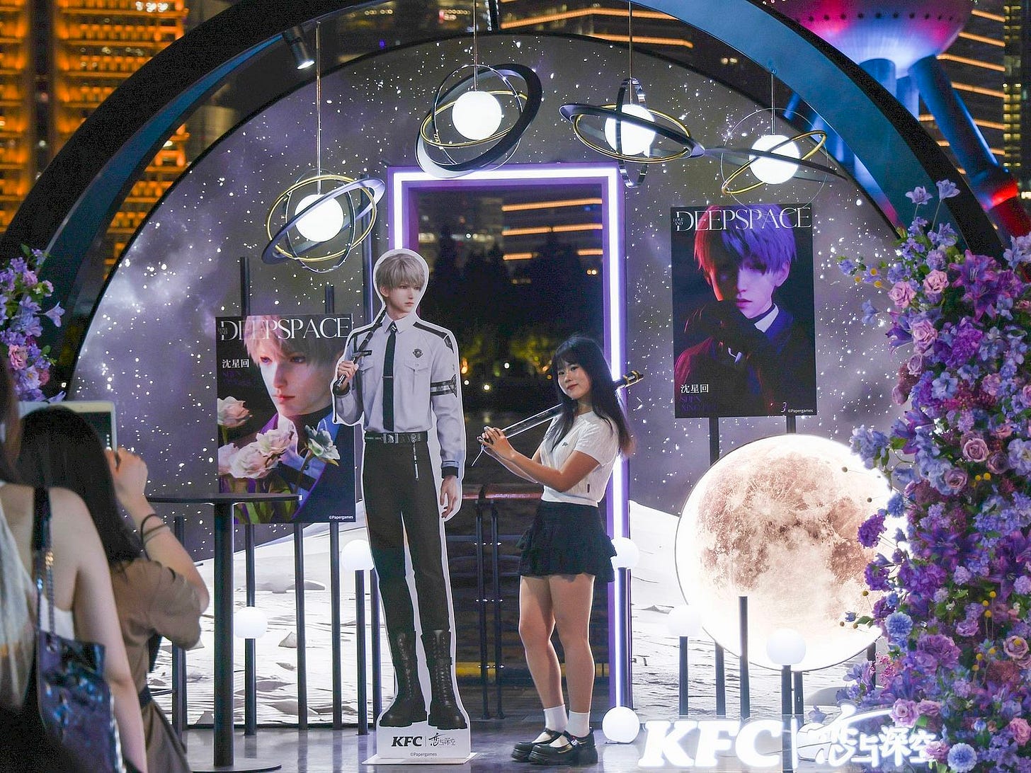 Chinese fangirls posing with Love and Deepspace characters